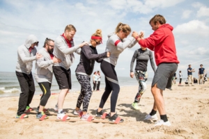 team participating in the beach ski during the Robinson's Quest