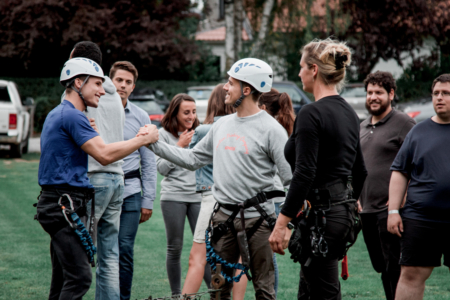 participants shaking hands after a Secret Agent School activity 