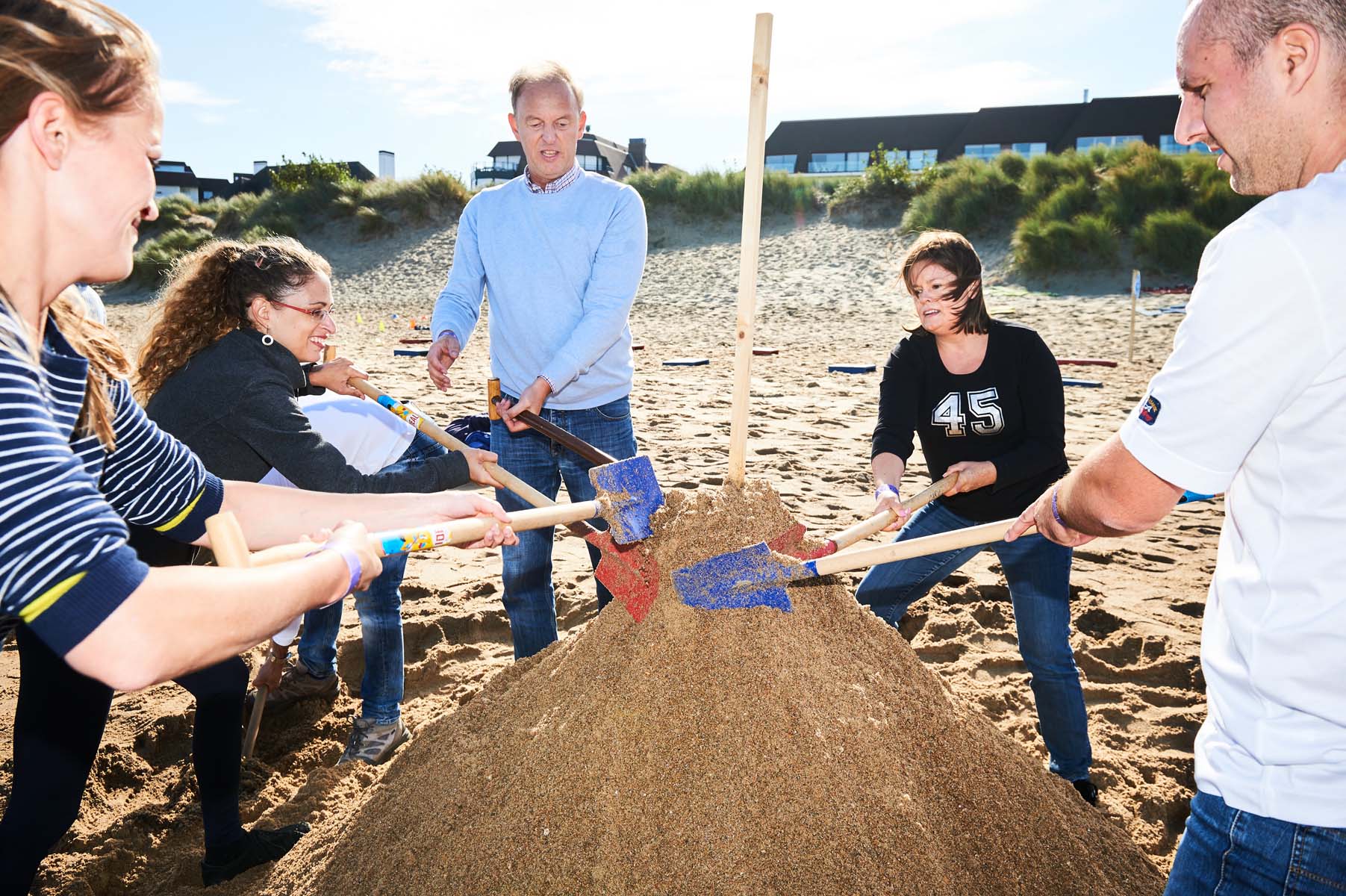 participants making with sand an event of the Beach & Water Olympics