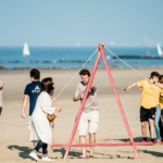 teams doing beach skiing and another Beach Olympics event