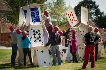 teams building giant houses of cards during Castle Investigation