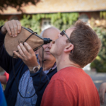 participant tasting a beverage during Enquête au Château