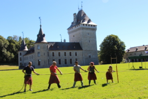 team pulling a rope during a Highland Games event