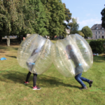 fight between 2 participants in Bubble Bump during the Jengame