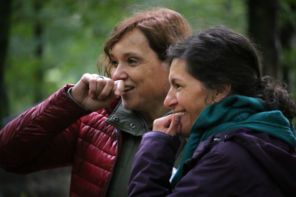 women laughing during teambooster