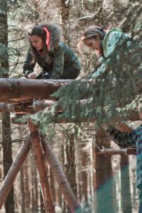 participants building the top of the bridge during the Lumberjack