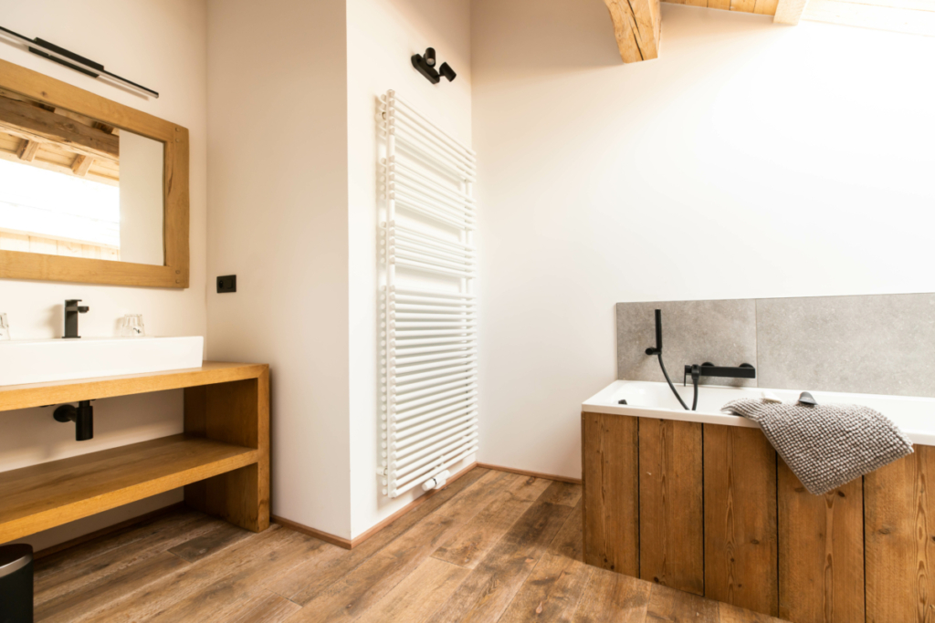 Salle de bain avec un bain Tero Lodge Jalhay